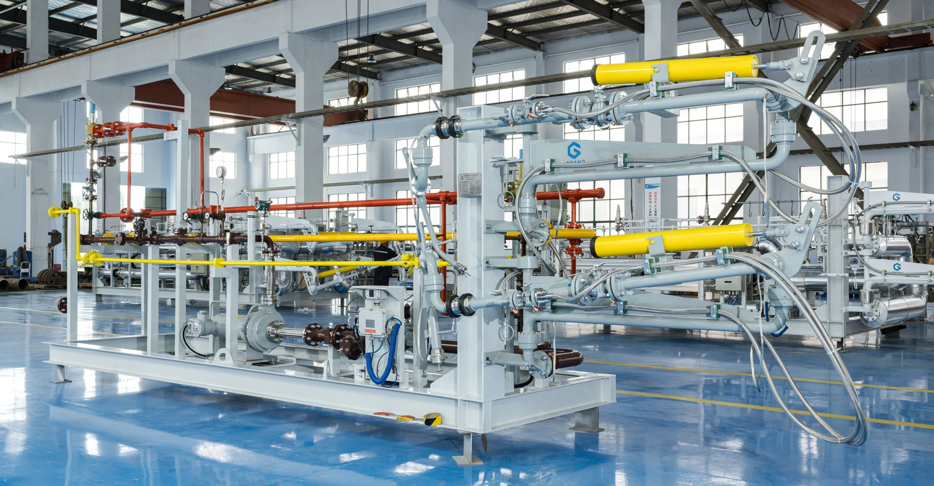 Hanlong loading skid and loading arms in workshop